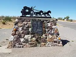 Vicinity marker where the Wickenburg Massacre took place (33°57′47″N 112°47′50″W﻿ / ﻿33.963080°N 112.797239°W﻿ / 33.963080; -112.797239)