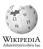 Wikipedia logo displaying the name "Wikipedia" and its slogan: "The Free Encyclopedia" below it, in Dinka