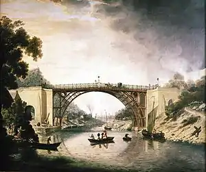 A painting of the bridge, from mid-river, in the picturesque style of the period. Smoking furnaces can be seen in the distance and a Severn trow is alongside the bridge. Two wealthy coaches are visible, as are a well-dressed party of sightseers in a small boat.