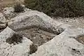 Wine press carved in rock at Bayt Nattif