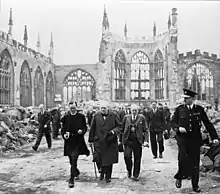 Winston Churchill visiting the ruins of the old cathedral in 1941