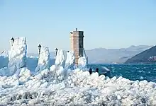 Senj harbor chained with snow after a cold front