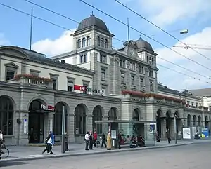 Renaissance-style building with twin cupola-topped towers