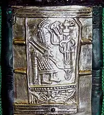 Wolf headed warrior on the Gutenstein scabbard [de].