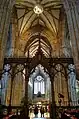 The rood screen, nave and west window