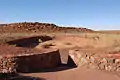 Ruins at Wupatki National Monument, Arizona.  There is disagreement among archaeologists whether these structures in the American Southwest were used for ballgames, although the consensus appears that they were.  There is further discussion concerning the extent that any Southwest ballgame is related to the Mesoamerican ballgame.