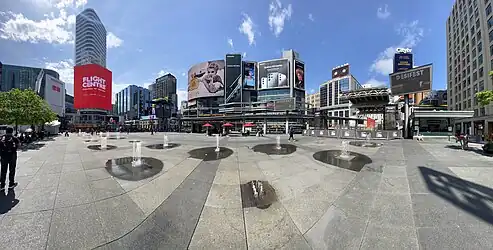 A 180-degree panoramic view taken from the centre of the square.