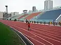 Running track and uncovered East Grandstand