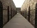 Prison cells with courtyard.