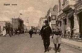 An Italian Carabiniere and an Arabic Zaptié patrolling in Tripoli, 1914