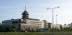 Large, low gray building housing Croatian Radiotelevision headquarters in Zagreb