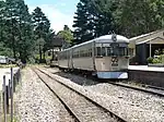 Queensland 2000 class rail motor. Burnt in October 2013 bushfire. Dismantled for scrap in 2018