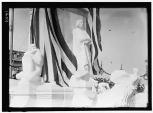 Close-up of the statue of Columbus still surrounded by the Stars and Stripes veil