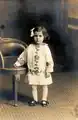 Black and white studio portrait of Violet Archer, age 4