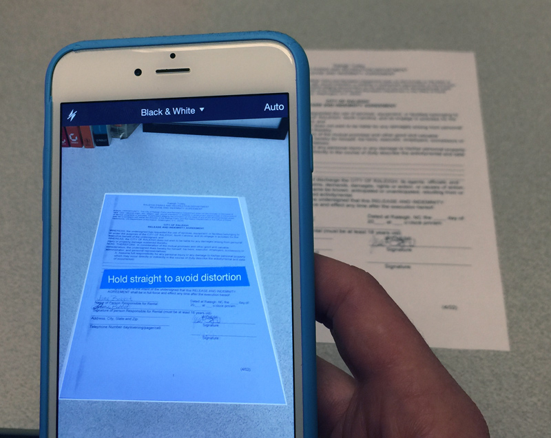 holding the device at an angle instead of directly above the document