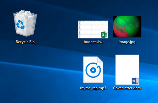 several files on the desktop, showing file extensions