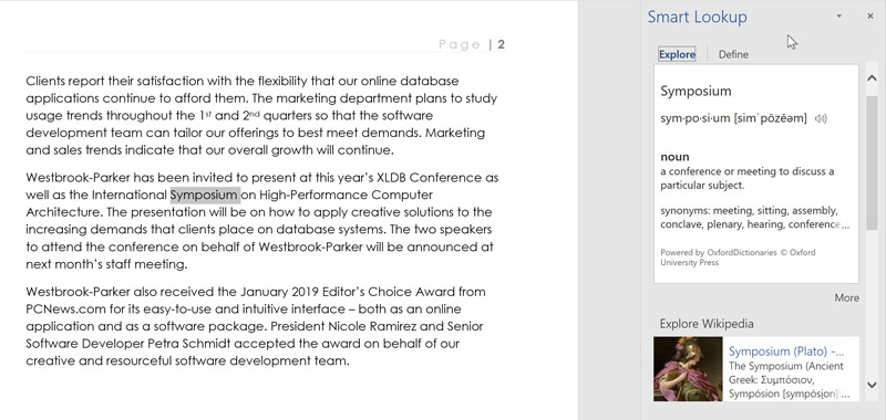 The Smart Lookup feature showing search results for the word 'symposium'.